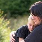 Woman Sad Comfort Child - DIY Family Law Australia
